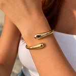 Tresse d’Or Twist Bangle – demi-fine bracelet, 18K PVD gold, waterproof | Éktaraa